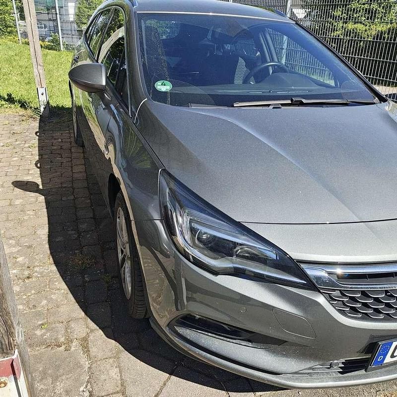 Grau Gebraucht 2016 Opel Astra Edition Kombi | 9.100 € (Guter Preis) - Bild 1/4
