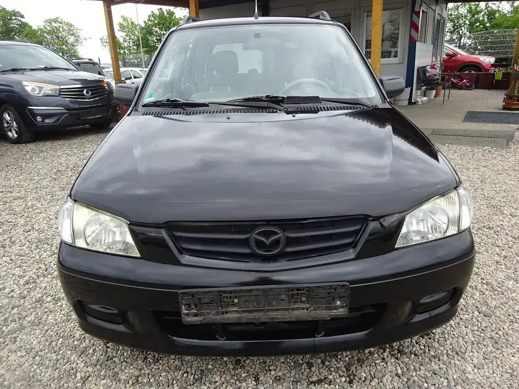 Używany Mazda Demio 63 KM (46 kW) 2002 Czarny Hatchback
