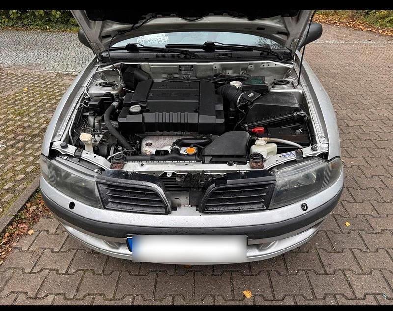 Gebraucht Mitsubishi Carisma 106 PS (77 kW) 2003 Grau Limousine