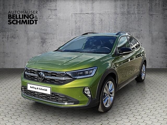 Visual green (metallic) Gebraucht 2024 VW Taigo Move SUV | 24.290 € (Guter Preis) - Bild 1/4