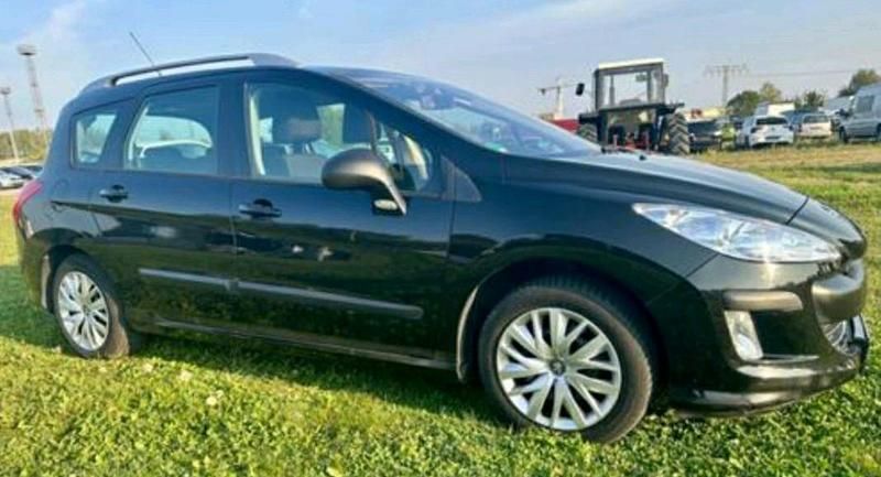 Schwarz Gebraucht 2010 Peugeot 308 SW Kombi | 2.500 € - Bild 1/4