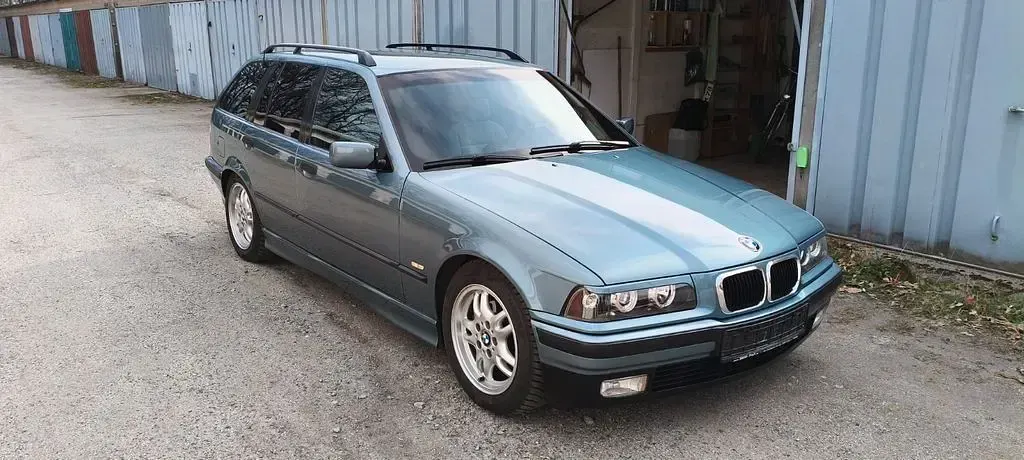 Używany BMW 320 Basis 150 KM (110 kW) 1997 Zielony Kombi