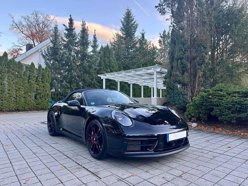 Schwarz a1 Gebraucht 2022 Porsche 911 Carrera GTS Cabrio | 163.790 € (Fairer Preis) - Bild 1/4