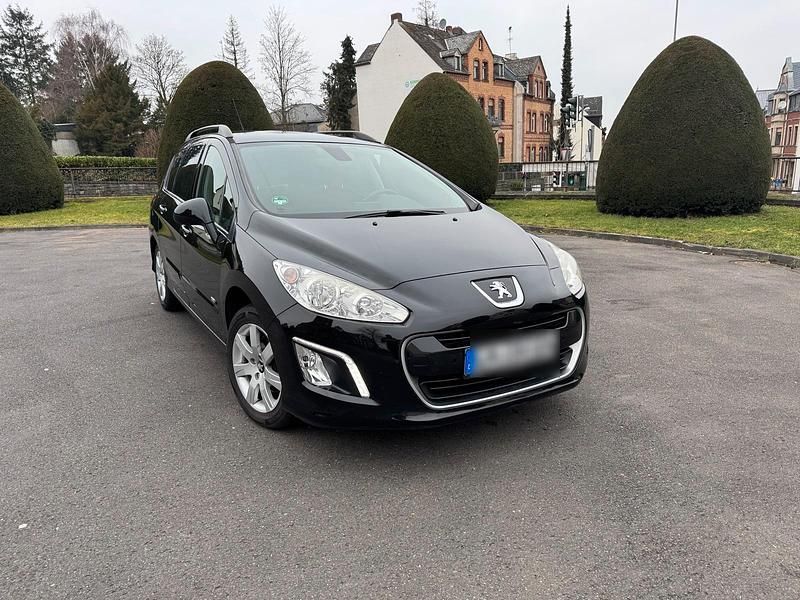 Schwarz Gebraucht 2013 Peugeot 308 Kombi | 4.500 € - Bild 1/4