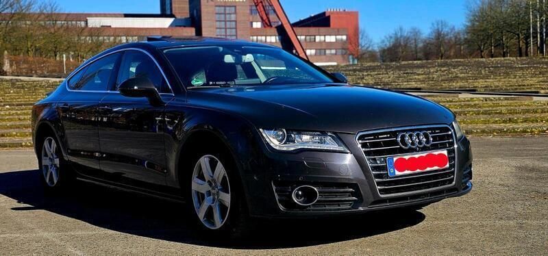 Grau Gebraucht 2012 Audi A7 Comfort Kleinwagen | 12.990 € (Superpreis) - Bild 1/4