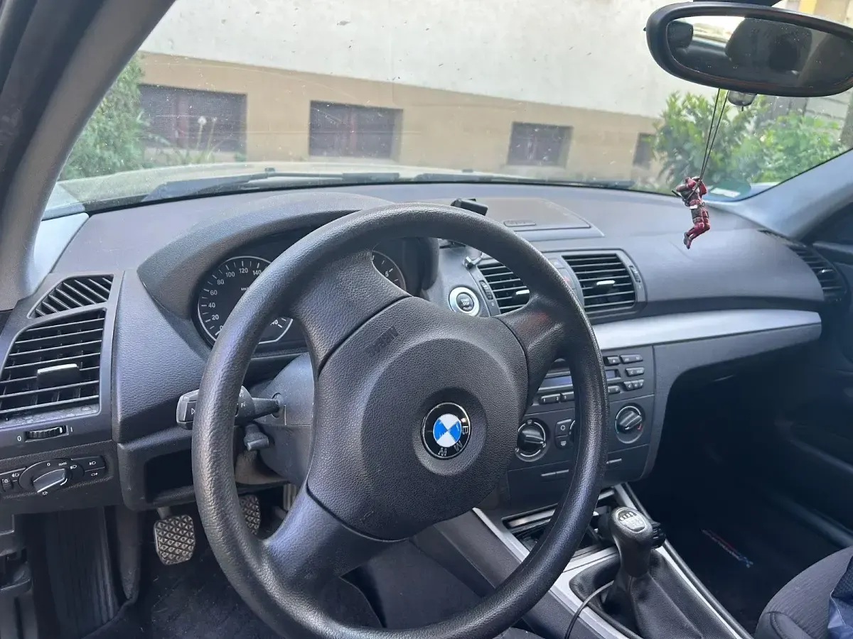 Second-hand BMW 116 122 CP (89 kW) 2008 Negru Hatchback