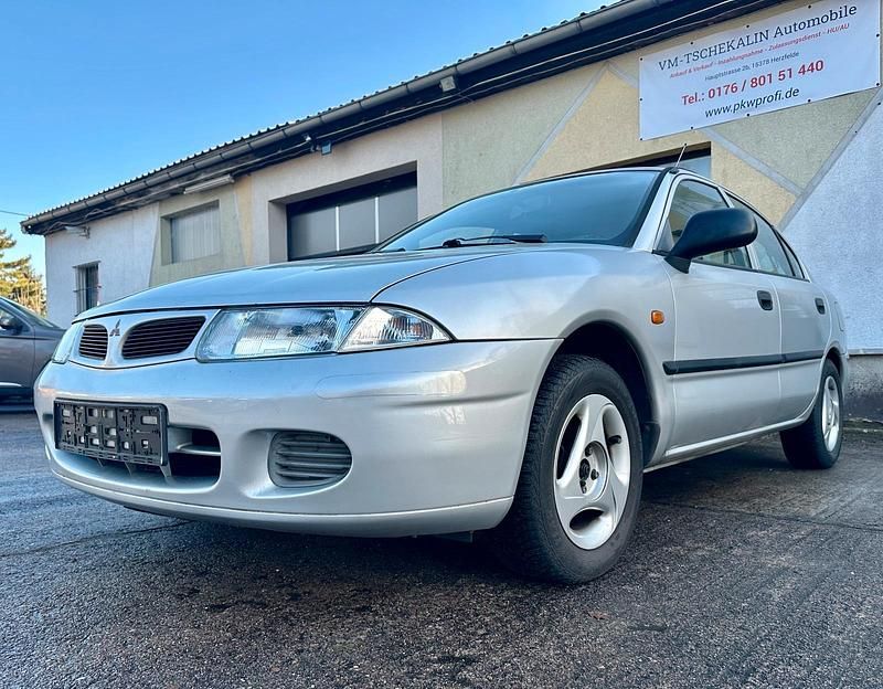Gebraucht Mitsubishi Carisma 90 PS (66 kW) 1998 Silber Limousine