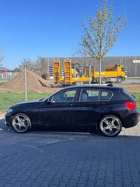 Używany BMW 116 116 KM (85 kW) 2016 Czarny Hatchback