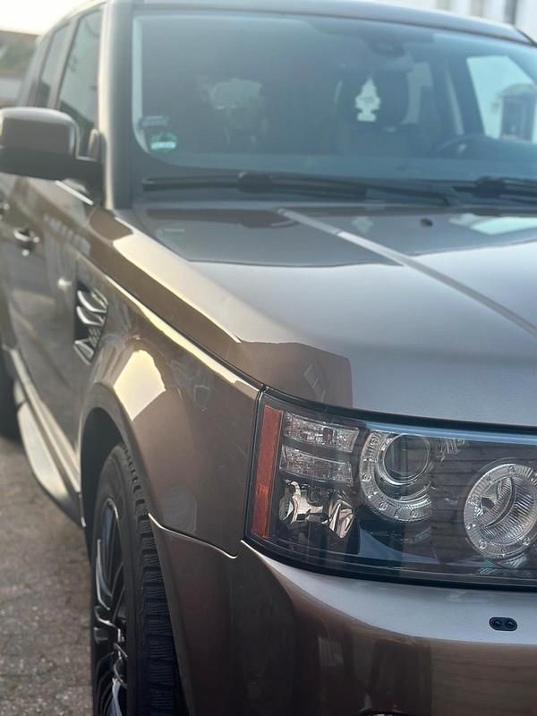 Braun Gebraucht 2012 Land Rover Range Rover Sport SUV | 9.500 € - Bild 1/4