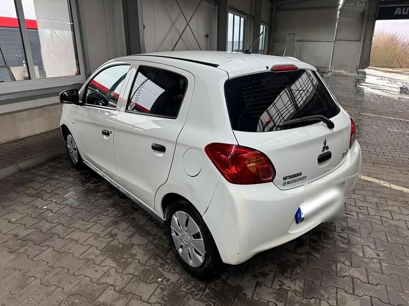 Gebraucht Mitsubishi Space Star 70 PS (51 kW) 2015 Weiß Kleinwagen