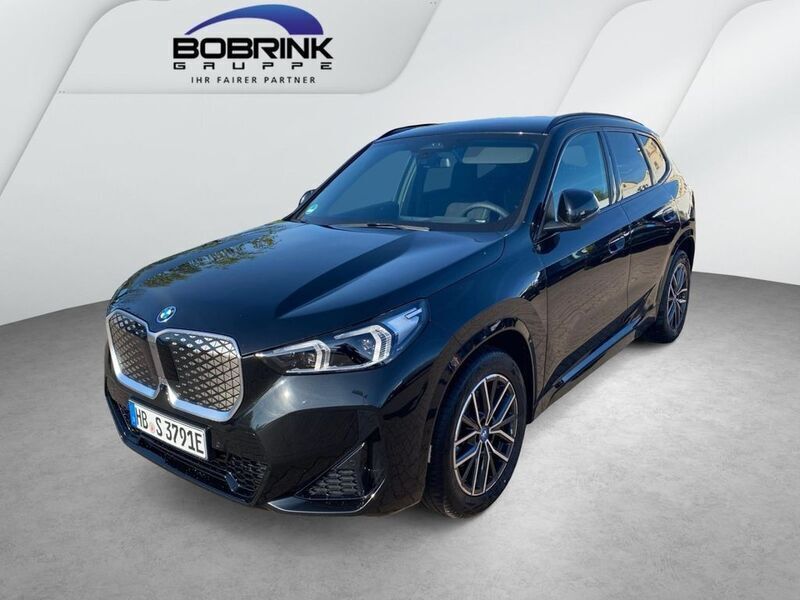 Schwarz Gebraucht 2025 BMW iX1 M Sport SUV | 49.200 € (Teuer) - Bild 1/4