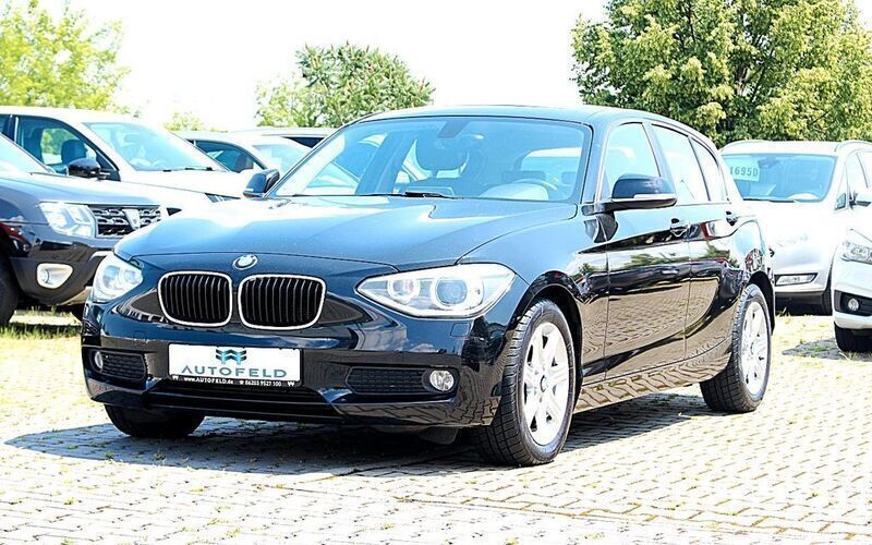 Schwarz Gebraucht 2013 BMW 116 Sport Line Kleinwagen | 6.450 € (Guter Preis) - Bild 1/4