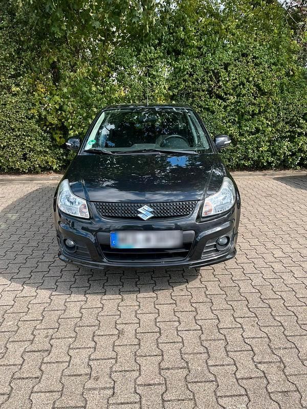 Schwarz Gebraucht 2013 Suzuki SX4 City+ Limousine | 7.000 € (Fairer Preis) - Bild 1/4