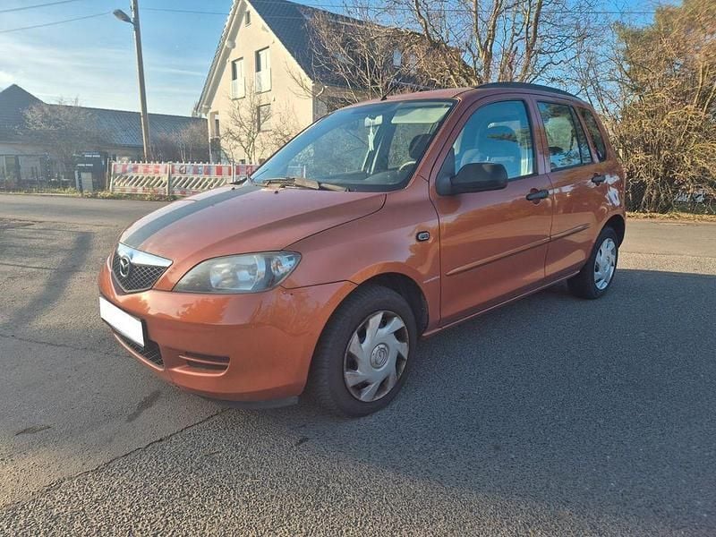 Orange Gebraucht 2003 Mazda 2 Exclusive Limousine | 550 € (Superpreis) - Bild 1/4