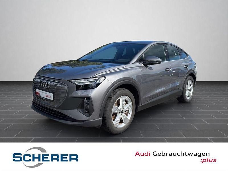 Taifungrau metallic (metallic) Gebraucht 2024 Audi Q4 Sportback e-tron Ambiente SUV | 47.500 € (Teuer) - Bild 1/4