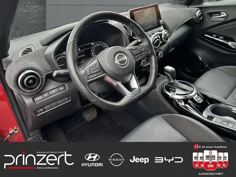 Gebraucht Nissan Juke 143 PS (105 kW) 2023 Fuji sunset red/black SUV