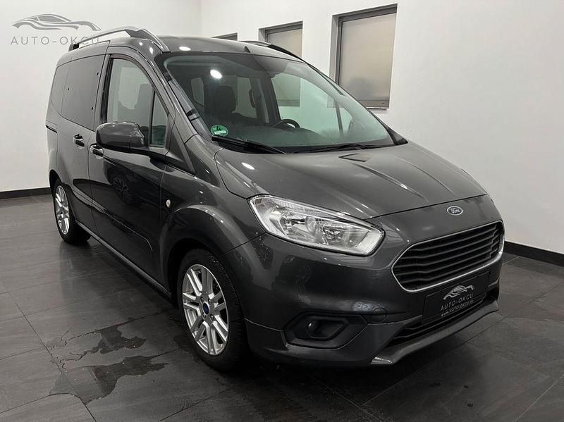 Gebraucht Ford Tourneo Courier Titanium 101 PS (74 kW) 2019 Grau Van / Kleinbus