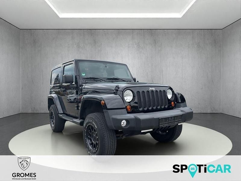 Schwarz Gebraucht 2013 Jeep Wrangler Sahara SUV | 26.990 € (Guter Preis) - Bild 1/4