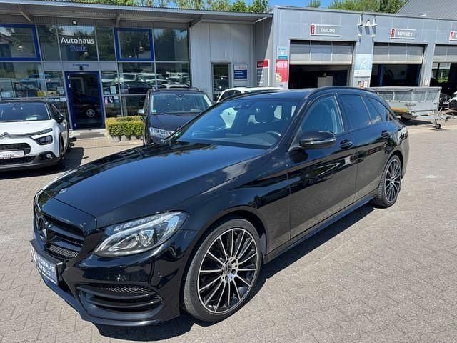 Schwarz Gebraucht 2018 Mercedes C220 AMG line Kombi | 21.473 € (Etwas zu teuer) - Bild 1/4