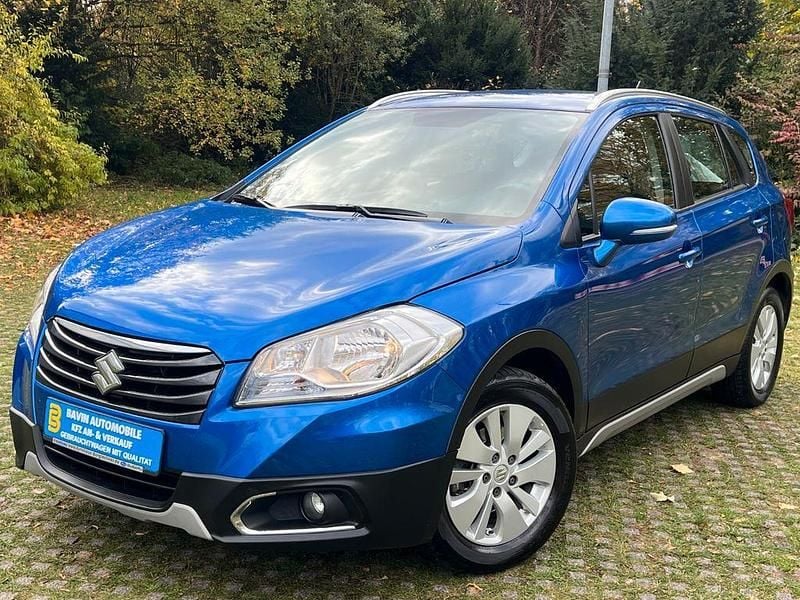 Blau Gebraucht 2013 Suzuki SX4 Comfort Limousine | 10.490 € (Teuer) - Bild 1/4