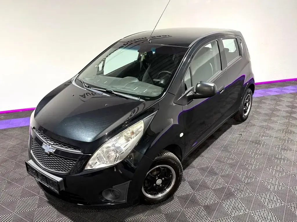 Gebraucht Chevrolet Spark 68 PS (50 kW) 2012 Schwarz Kleinwagen