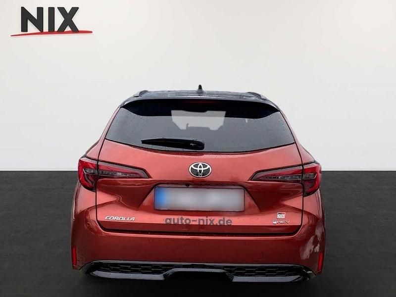 Gebraucht Toyota Corolla Basis 179 PS (131 kW) 2025 Metal oxide orange metallic, dach schwarz Kombi