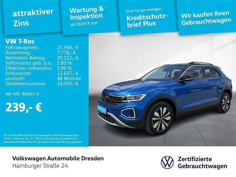 Ravennablau metallic schwarz Gebraucht 2024 VW T-Roc Move SUV | 27.990 € (Guter Preis) - Bild 1/2