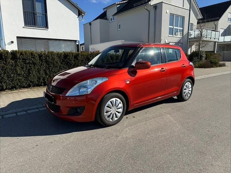 Gebraucht Suzuki Swift 75 PS (55 kW) 2012 Orange Kleinwagen