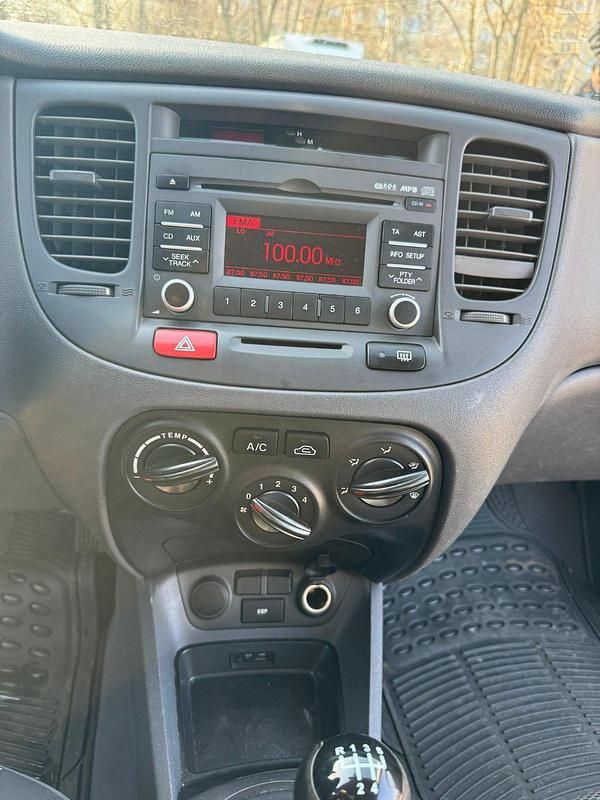 Gebraucht Kia Rio 80 PS (58 kW) 2011 Rot Kleinwagen