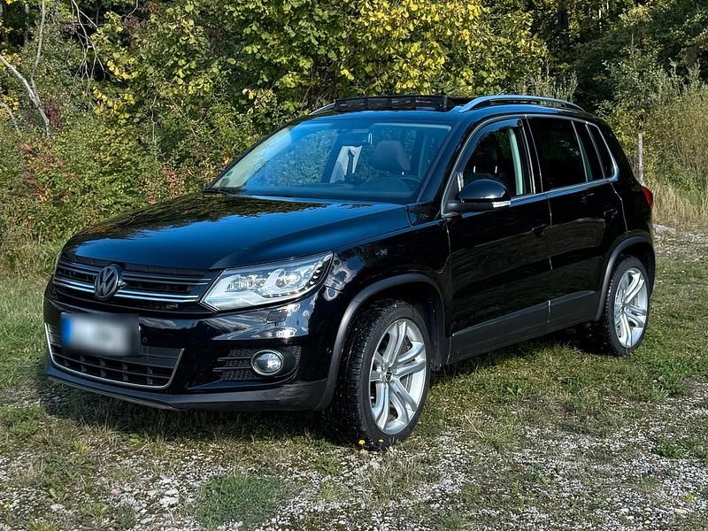 Schwarz Gebraucht 2011 VW Tiguan Sport SUV | 10.549 € (Etwas zu teuer) - Bild 1/4