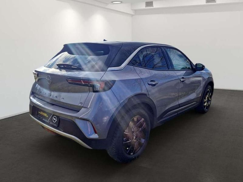 Gebraucht Opel Mokka-e Elegance 100 kW (136 PS) 2023 Kontrast grau (metallic) SUV