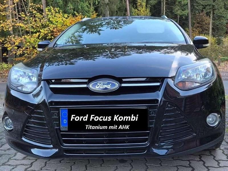 Schwarz Gebraucht 2014 Ford Focus Titanium Kombi | 5.100 € - Bild 1/4