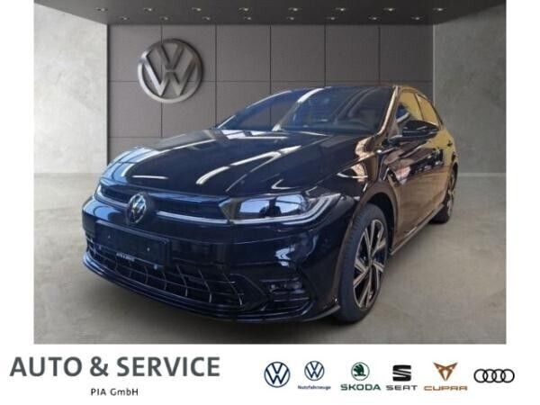 Schwarz (2t deep black perleffekt) Gebraucht 2024 VW Polo R-line Limousine | 30.991 € - Bild 1/4