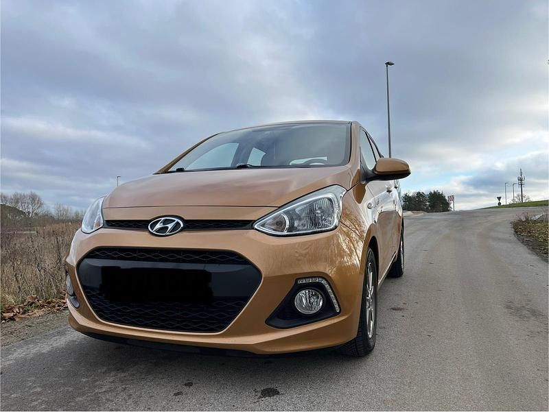 Gebraucht Hyundai i10 87 PS (63 kW) 2014 Orange Kleinwagen