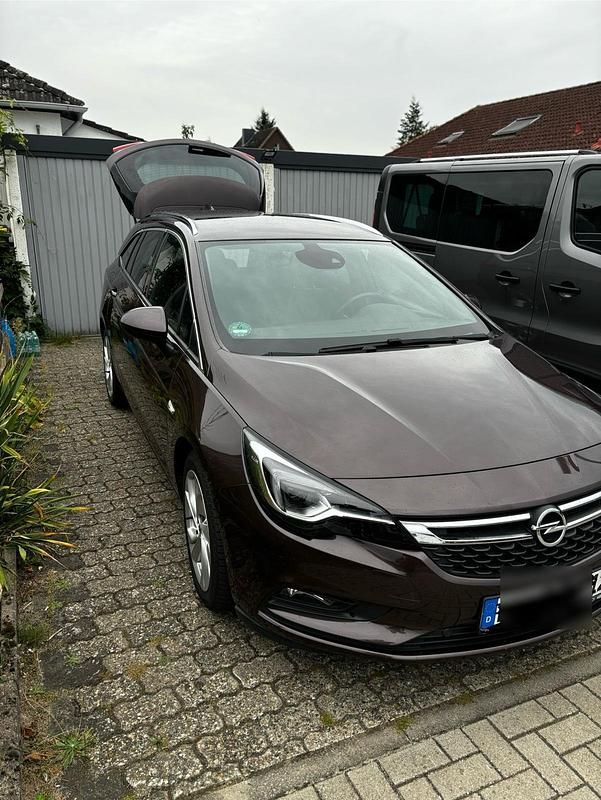 Braun Gebraucht 2017 Opel Astra Kombi | 12.550 € (Fairer Preis) - Bild 1/4