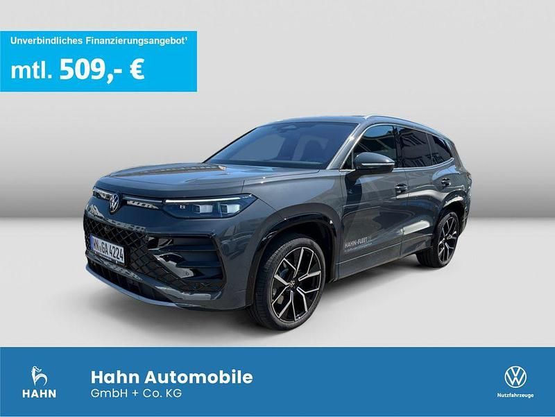 Grau Gebraucht 2024 VW Tayron R-line SUV | 55.390 € (Fairer Preis) - Bild 1/3