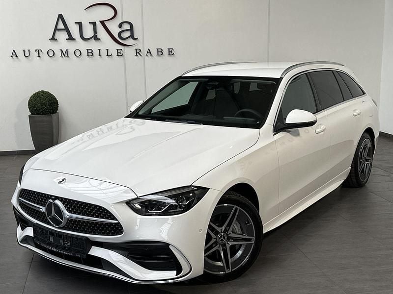 Polarweiã Gebraucht 2023 Mercedes C300e AMG line Kombi | 36.749 € (Guter Preis) - Bild 1/4