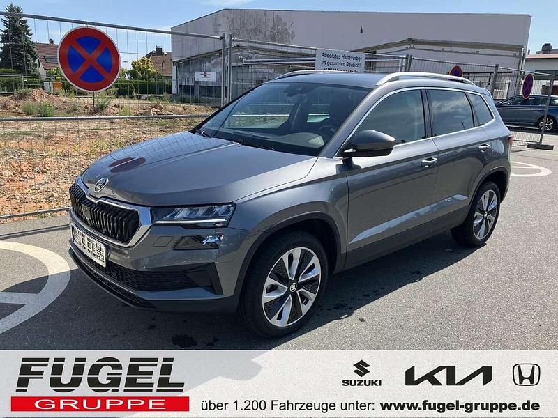 Graphitegrau metallic Gebraucht 2023 Skoda Karoq Style SUV | 28.899 € (Guter Preis) - Bild 1/4
