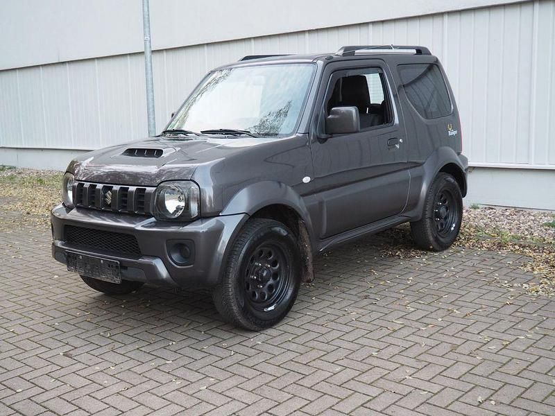 Schwarz Gebraucht 2014 Suzuki Jimny Ranger Comfort SUV | 13.990 € (Fairer Preis) - Bild 1/4