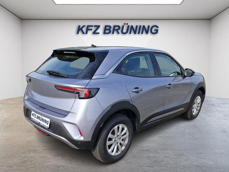 Gebraucht Opel Mokka-e Elegance 100 kW (136 PS) 2022 Kontrast grau metallic (metallic) SUV