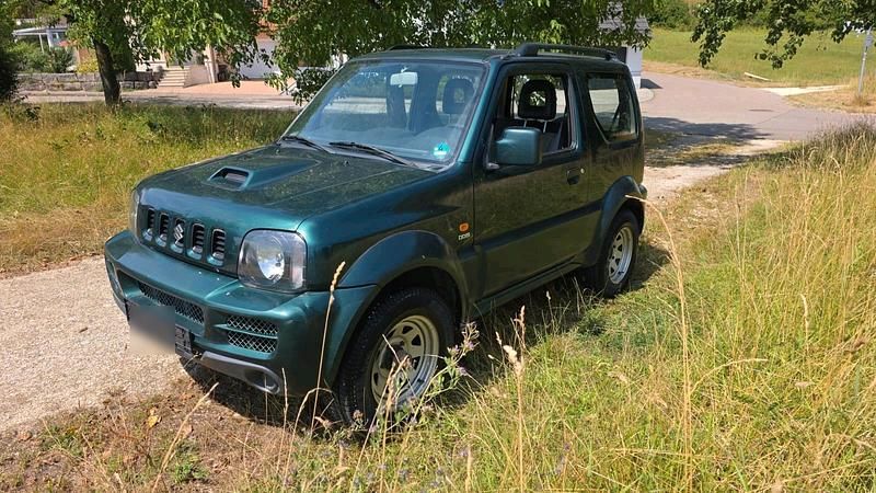 Grün Gebraucht 2007 Suzuki Jimny SUV | 6.490 € (Fairer Preis) - Bild 1/4