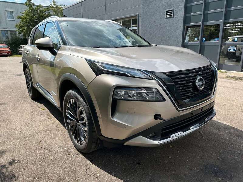Champagne silver metallic Neu 2024 Nissan X-Trail Tekna SUV | 49.900 € - Bild 1/4