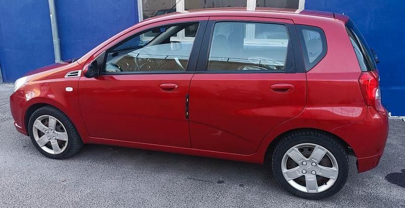 Gebraucht Chevrolet Aveo 84 PS (61 kW) 2011 Rot Limousine