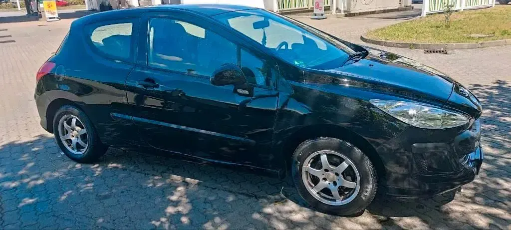 Gebraucht Peugeot 308 98 PS (72 kW) 2010 Schwarz Kleinwagen