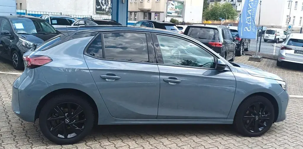 Gebraucht Opel Corsa 101 PS (74 kW) 2024 Grau mit schwarzem dach Kleinwagen