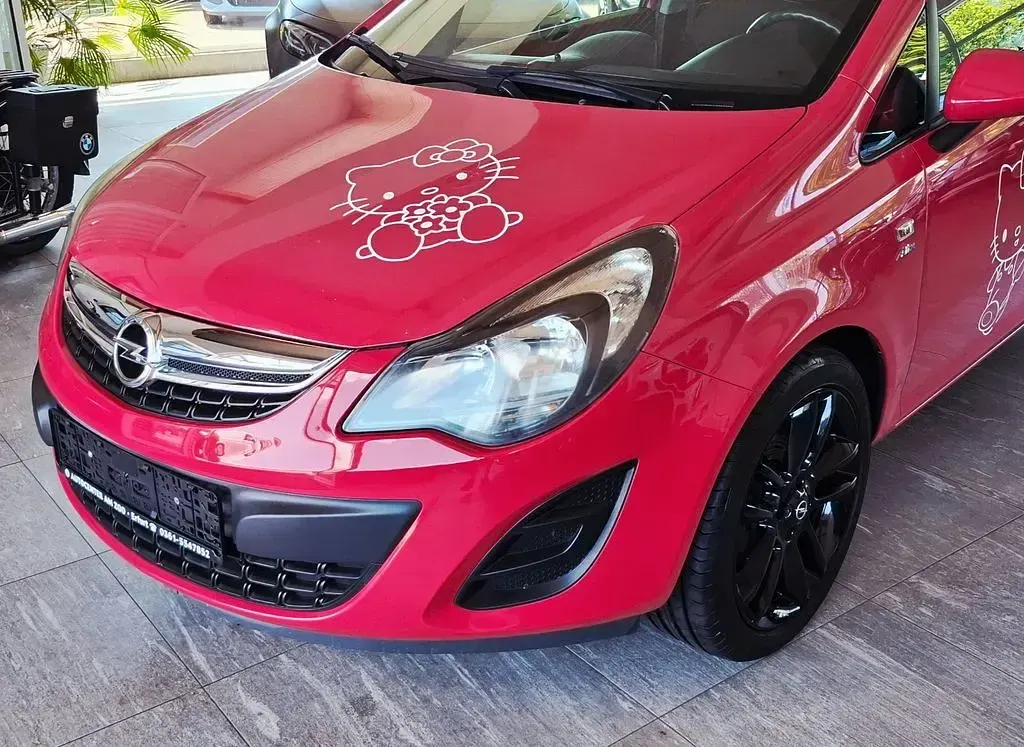 Gebraucht Opel Corsa Active 87 PS (63 kW) 2014 Rot Kleinwagen