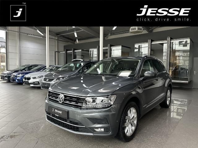 Grau (metallic) Gebraucht 2019 VW Tiguan Highline SUV | 26.990 € (Guter Preis) - Bild 1/4