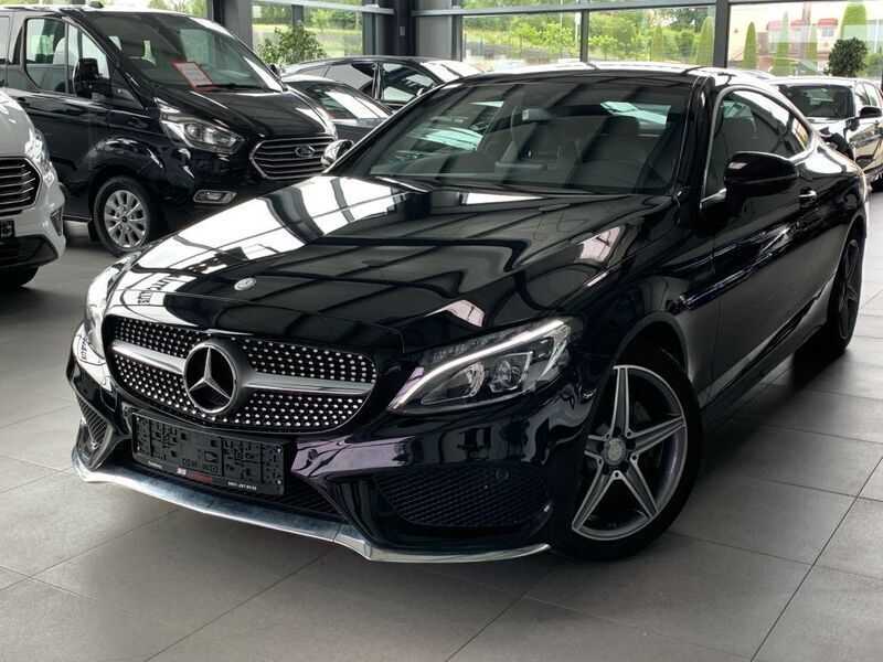 Schwarz unilack Gebraucht 2016 Mercedes C220 AMG line Coupé | 22.990 € (Teuer) - Bild 1/4