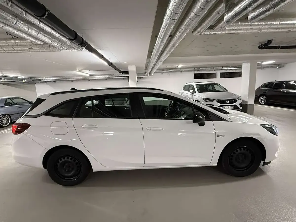 Gebraucht Opel Astra Edition 105 PS (77 kW) 2021 Schneeweiss/summitwhite/arctic Kombi
