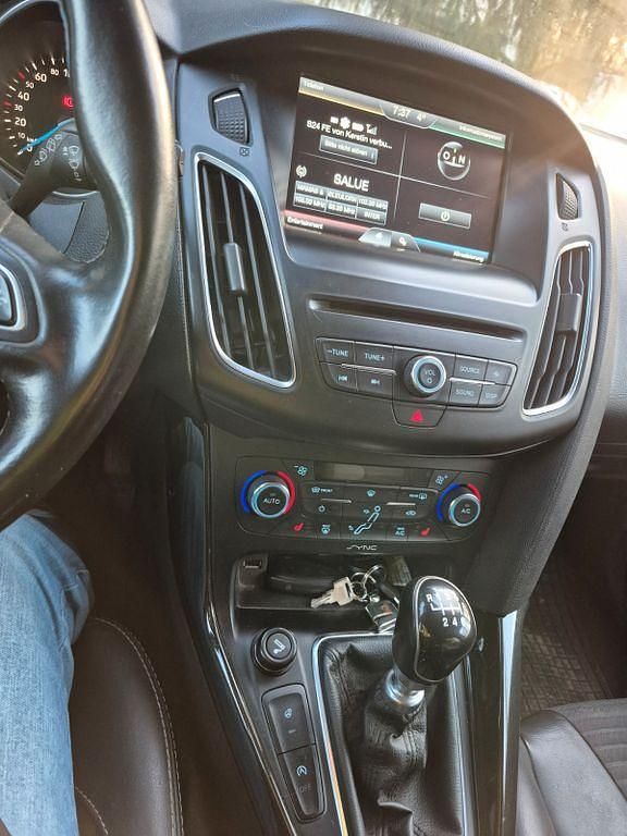 Używany Ford Focus Titanium 125 KM (91 kW) 2014 Czarny Sedan/Limuzyna